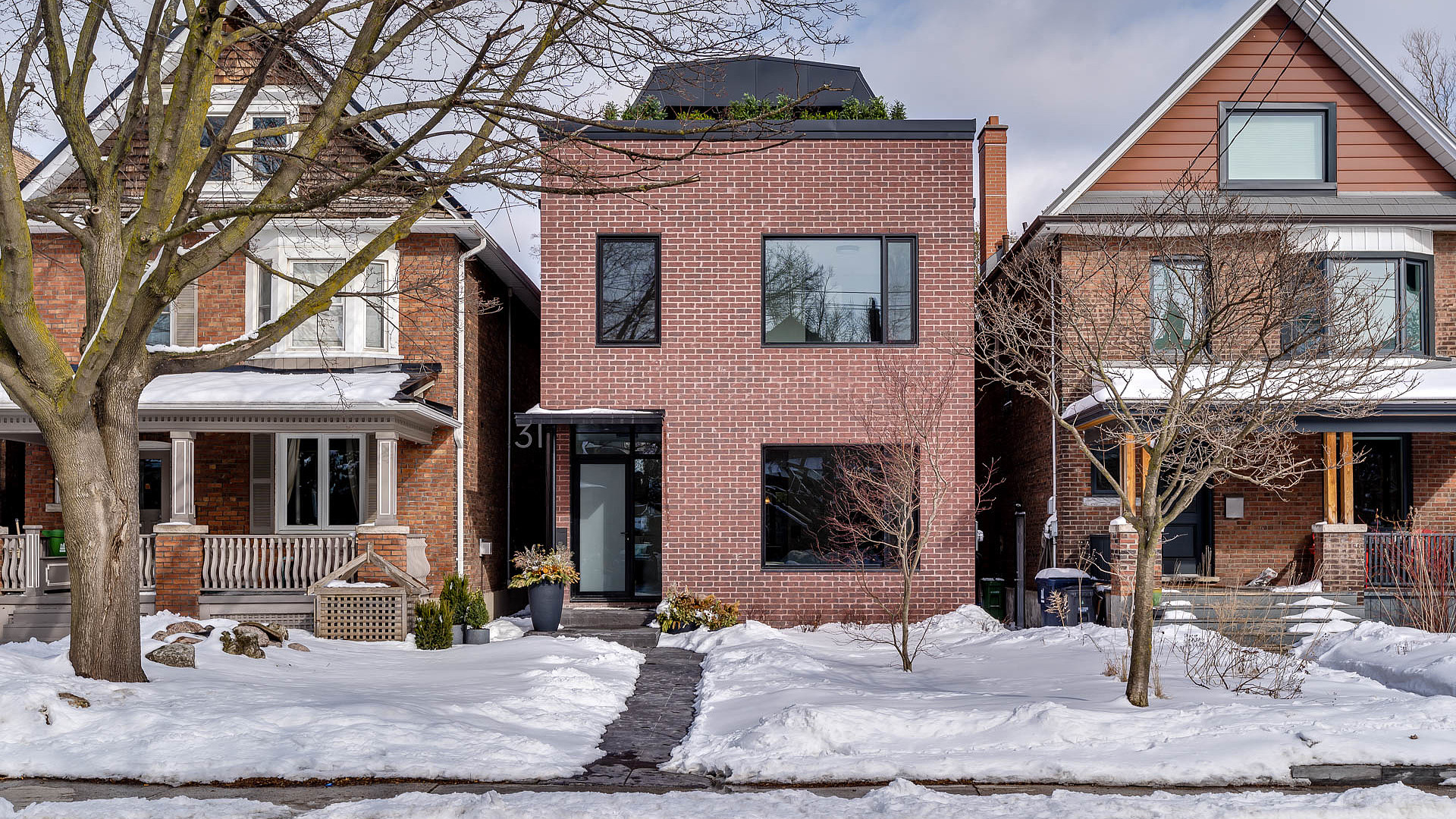 Modern brick custom home built by Morrabuilt Group in Toronto