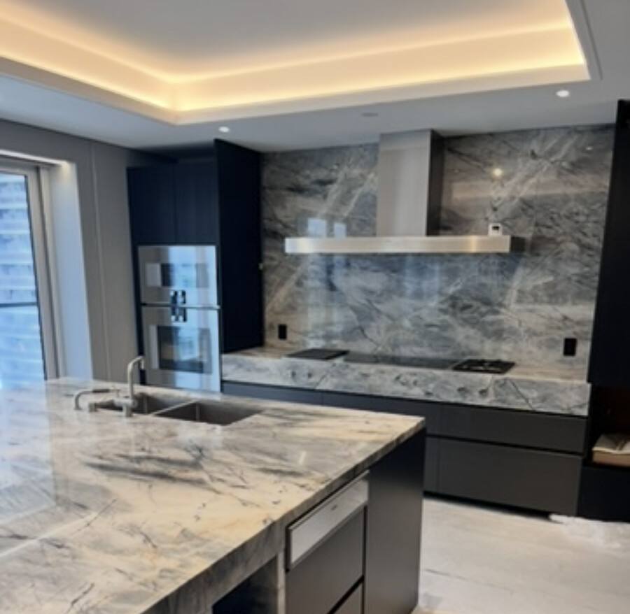 Polished kitchen with modern finishes and stone countertops