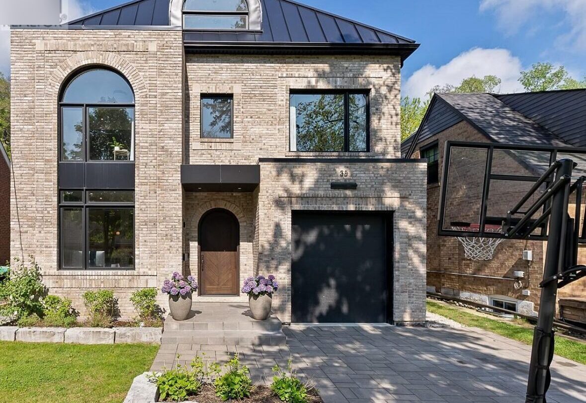 Custom stone home exterior Morrabuilt Group